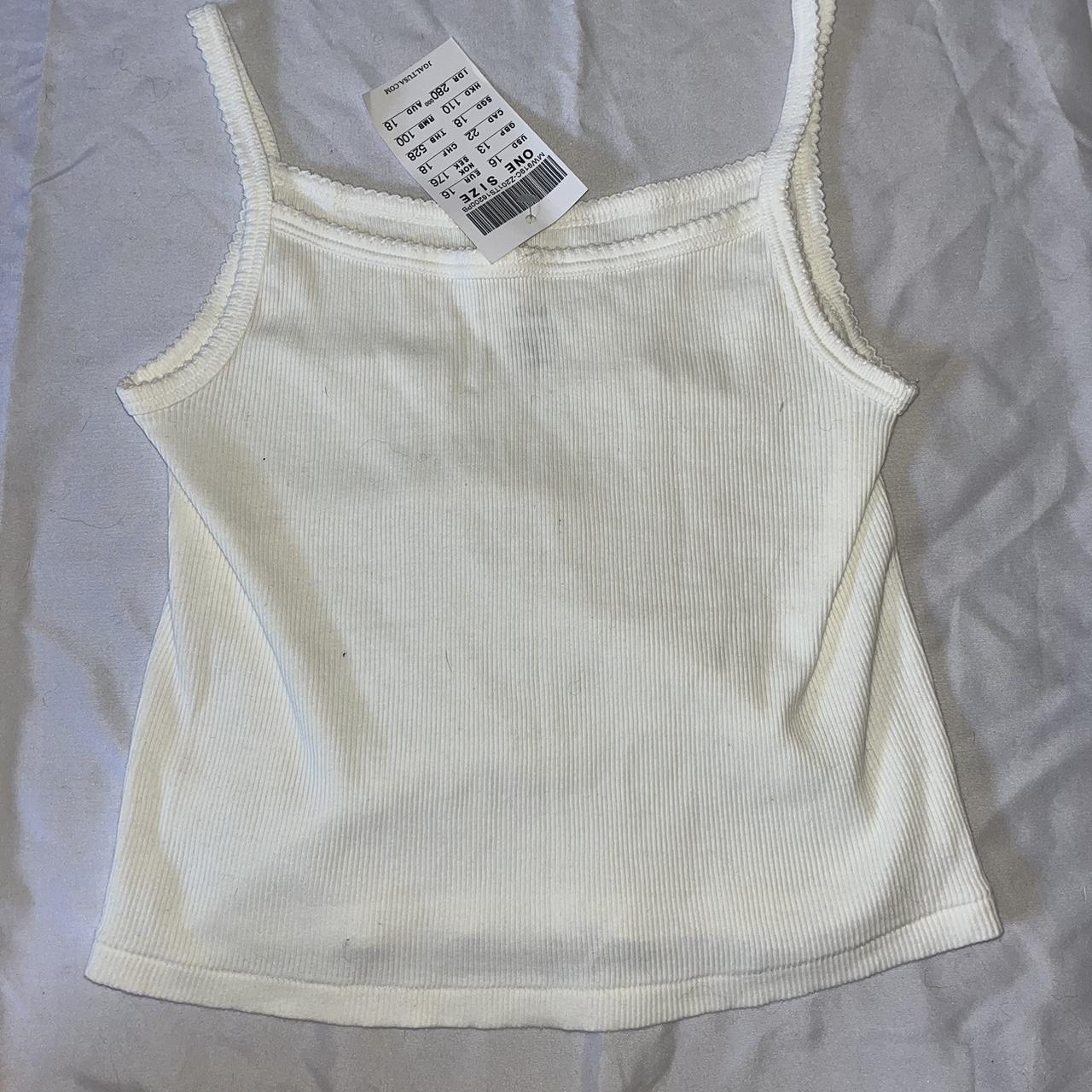 Brandy Melville white tank top - Depop