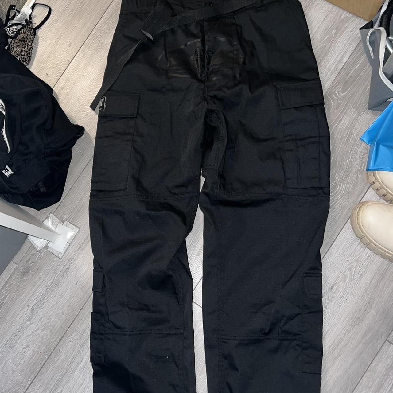 Corteiz Men's Black Trousers | Depop