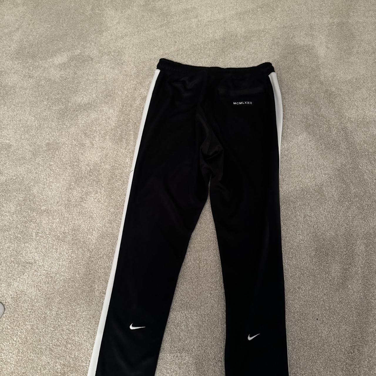 nike double swoosh tracksuit