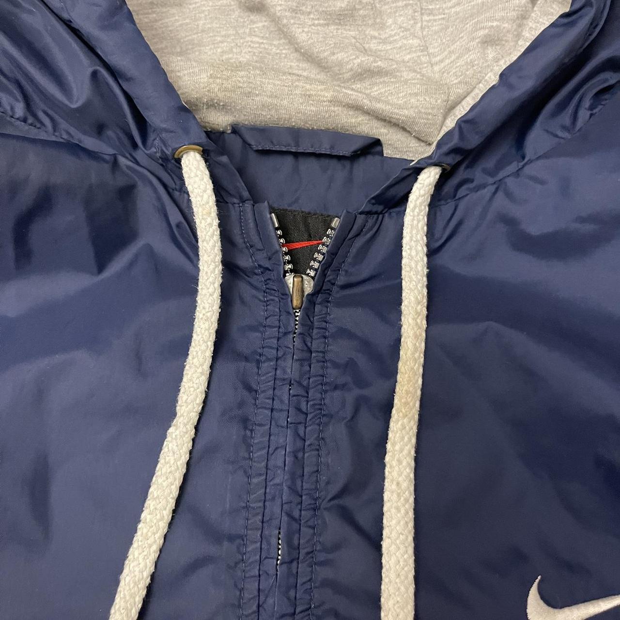 Nike navy blue on sale jacket