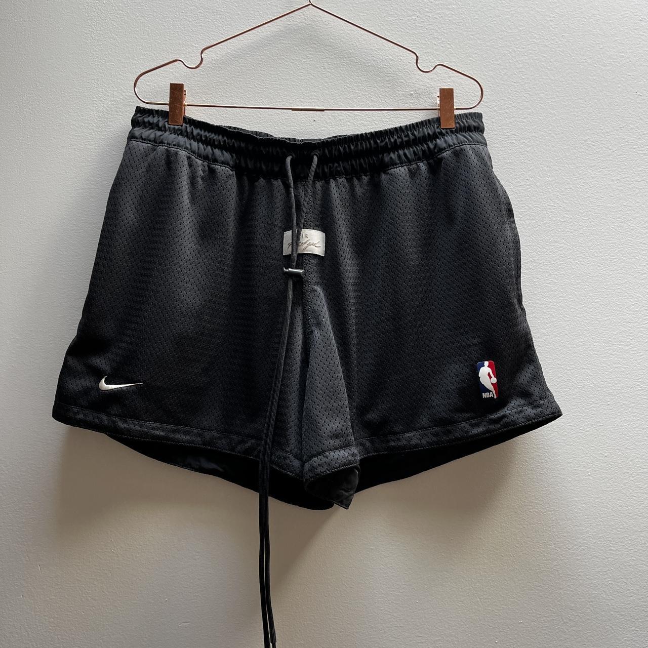 Fear of God hotsell X Nike Basketball Shorts Off Noir