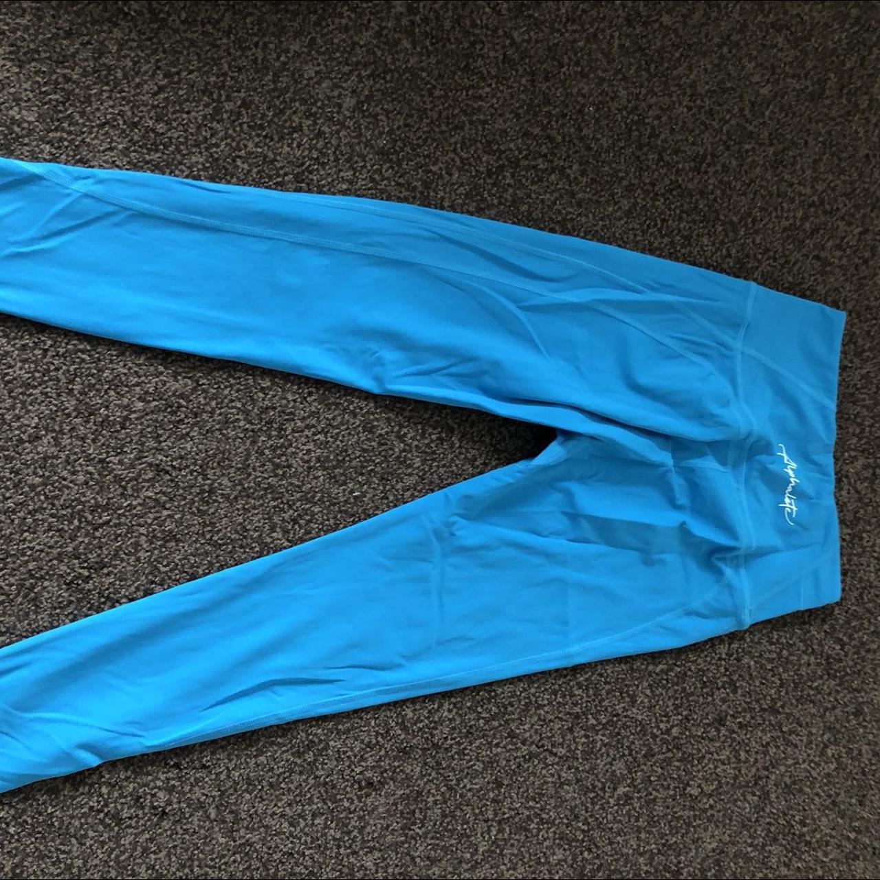 Alphalete gym leggings in blue Size small Open to... Depop