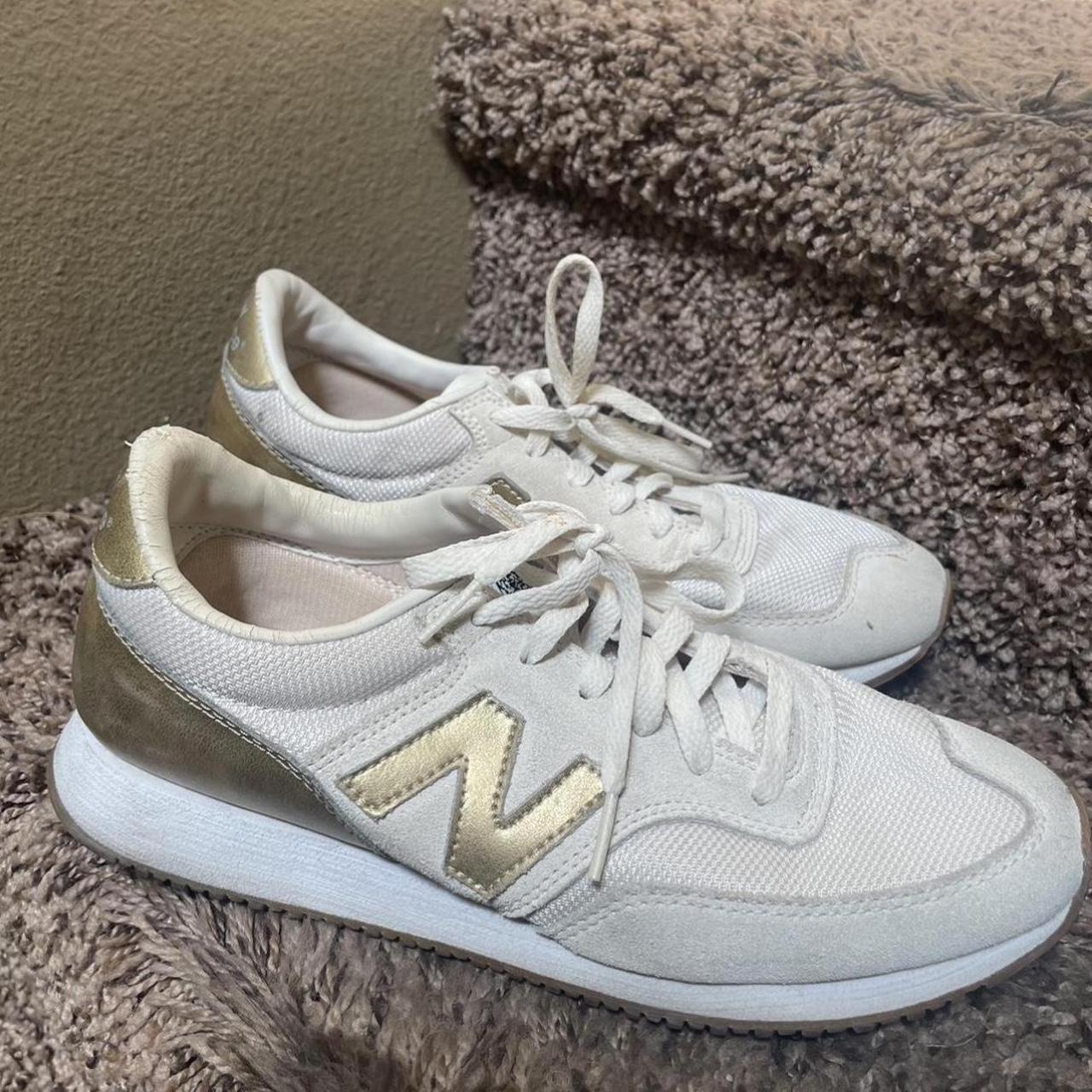 Cream/gold New balance shoes! missing sole cushions,... Depop