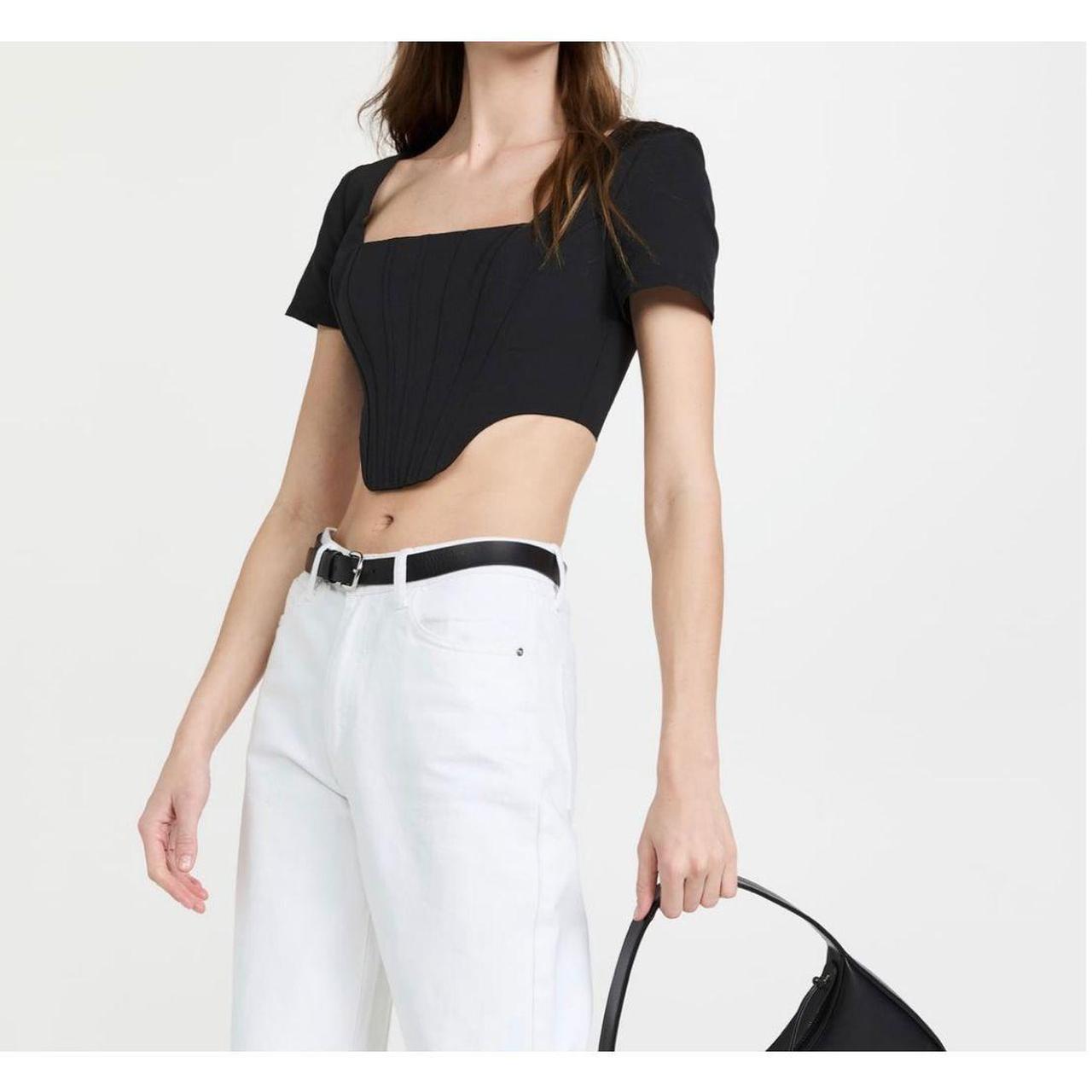 This crop top is designed in a bustier-style with a