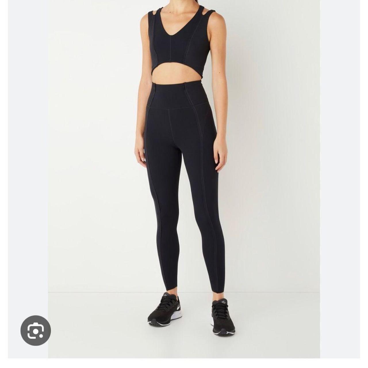 The Nike Yoga Luxe Dri-FIT Jumpsuit hugs you in a - Depop