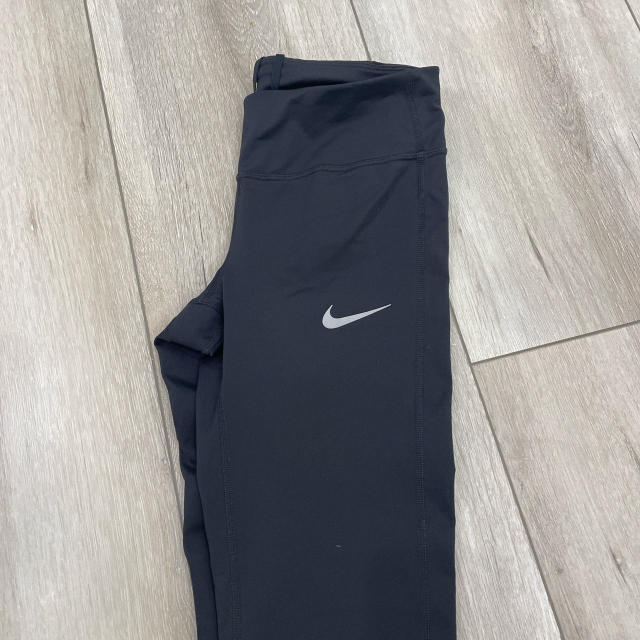 Nike dri-fit leggings with pocket on the side , Black