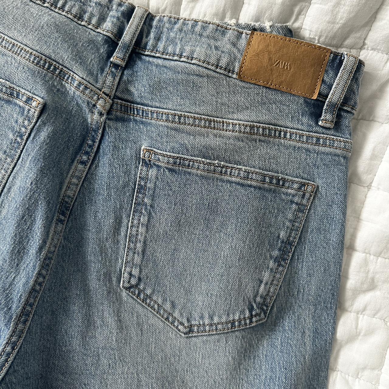 Light wash Zara jeans with slit at the ankle. Depop