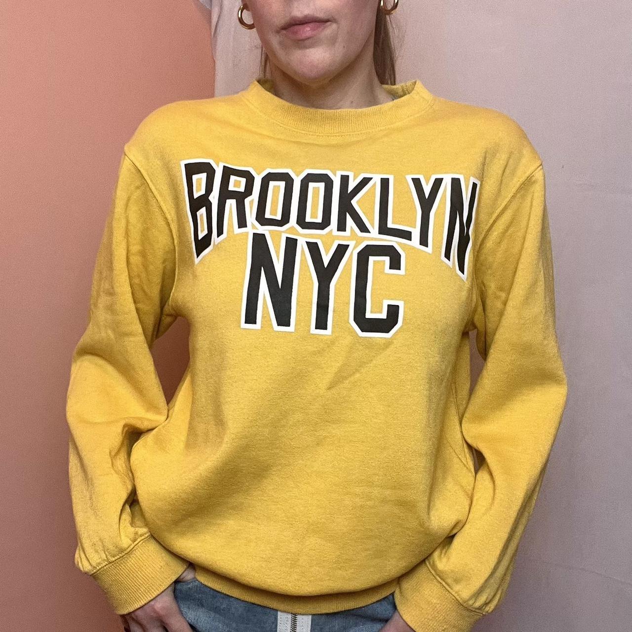 Brooklyn NYC yellow pullover sweater. It is in. Depop