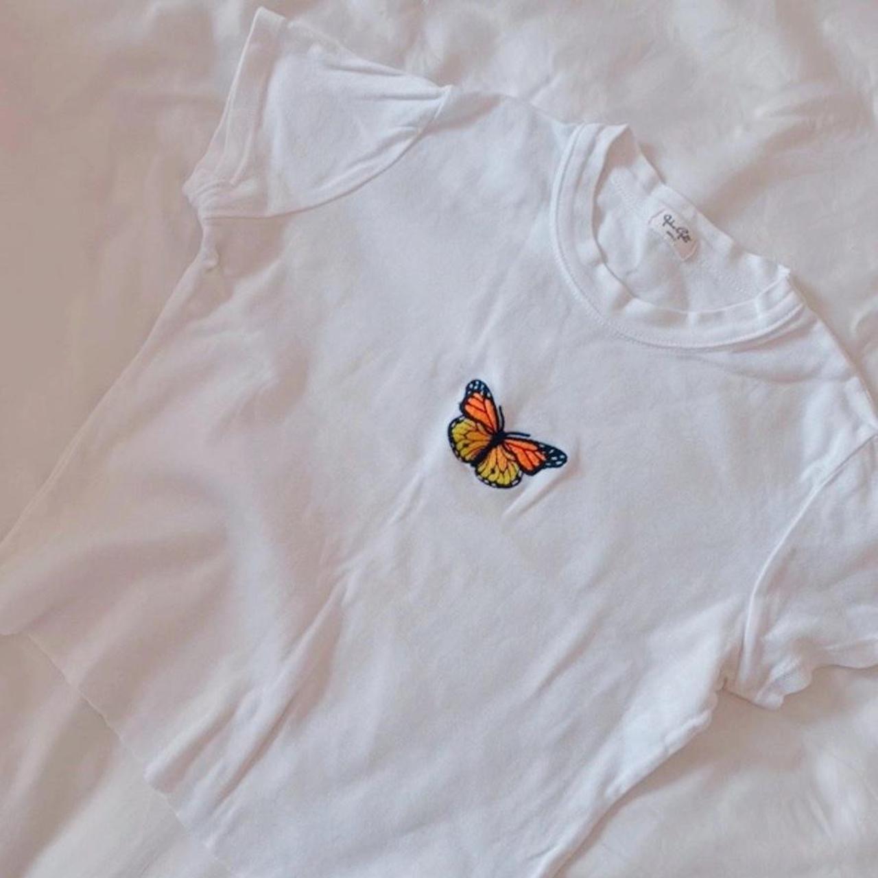 Brandy Melville butterfly tee John Galt / Brandy... Depop