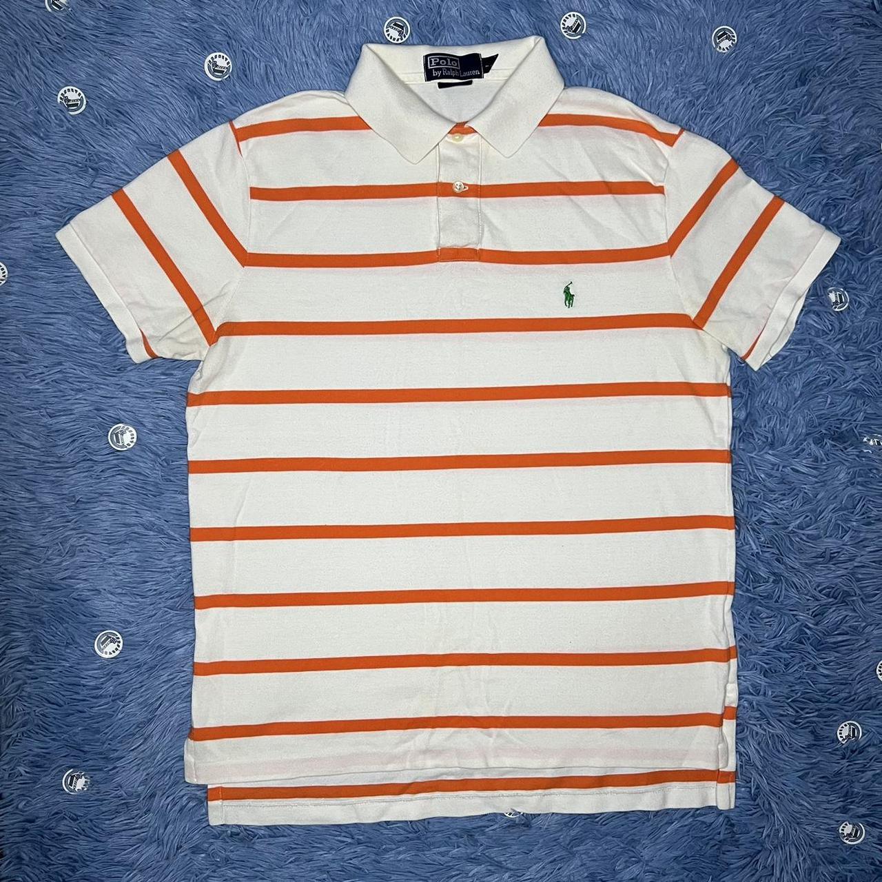 green polo shirt with orange horse