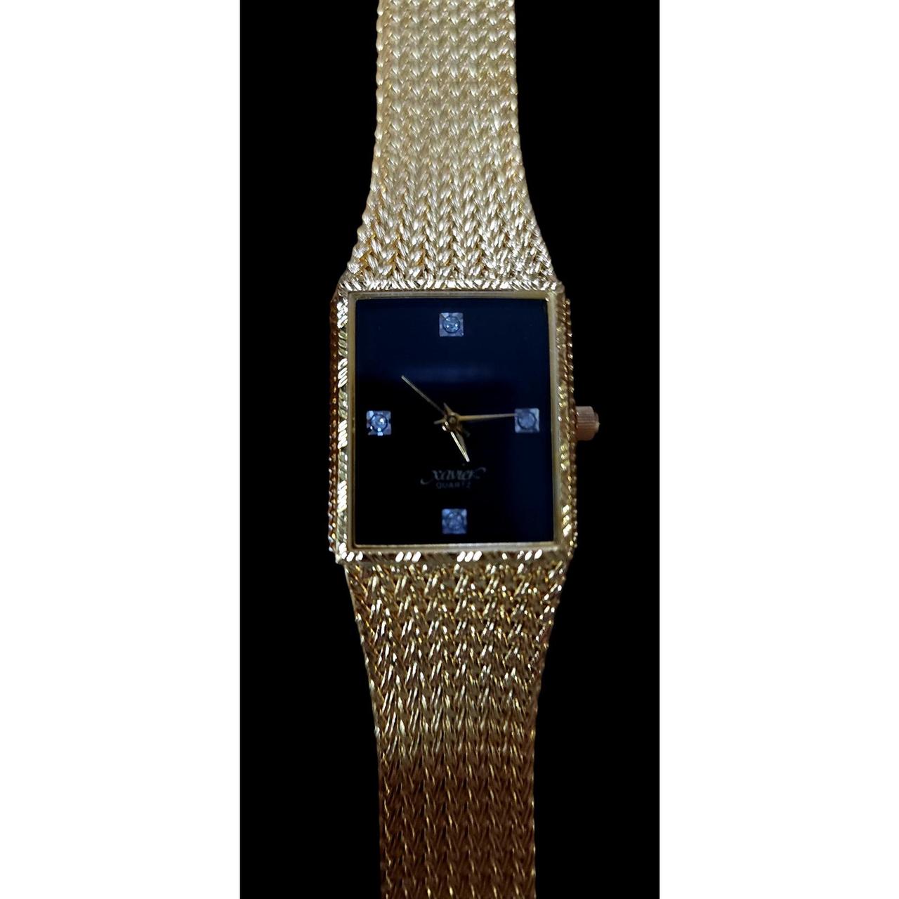 Xavier quartz gold online watch value