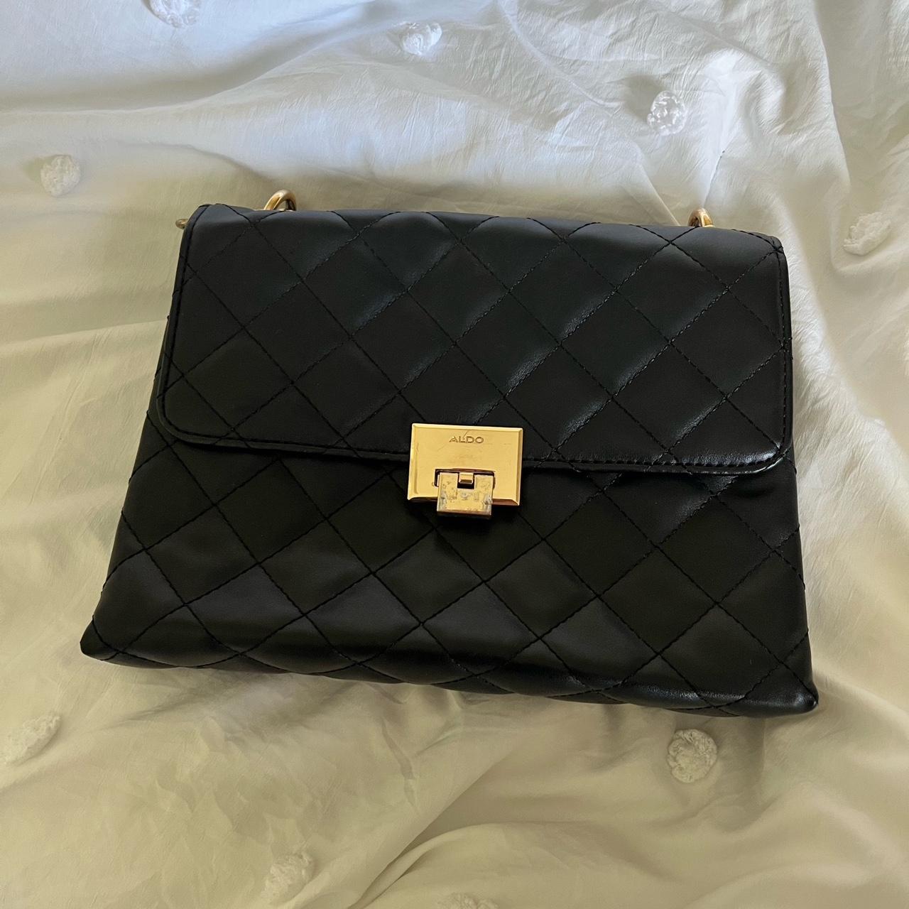 Aldo Black quilted purse The bag is in almost