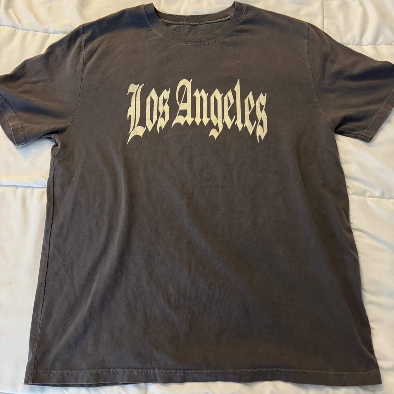  brandy melville graphic tee retails for 26 Depop