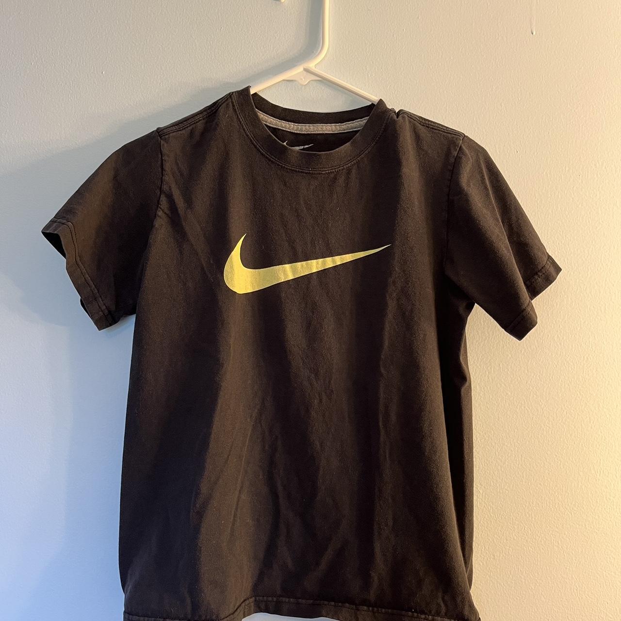 Nike Swoosh Grey T-Shirt Kids Large but would fit... - Depop