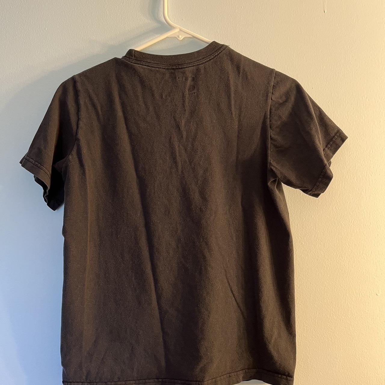 green and gray nike shirt