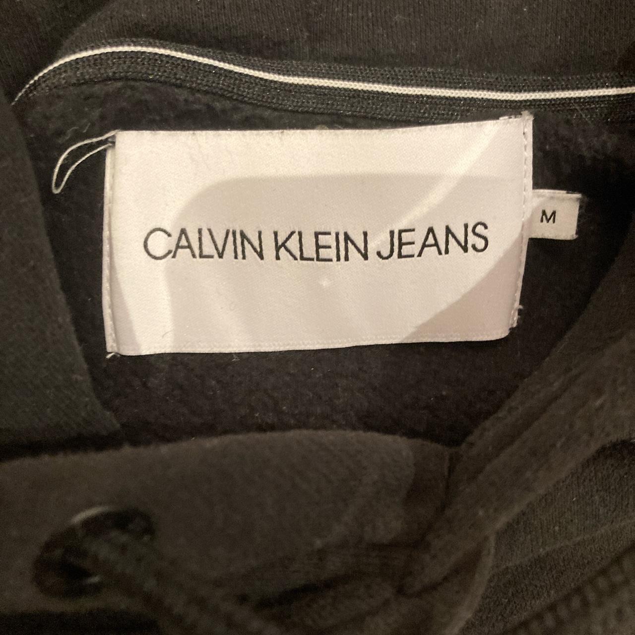 Calvin Klein Jeans Men's Black and Tan Hoodie | Depop