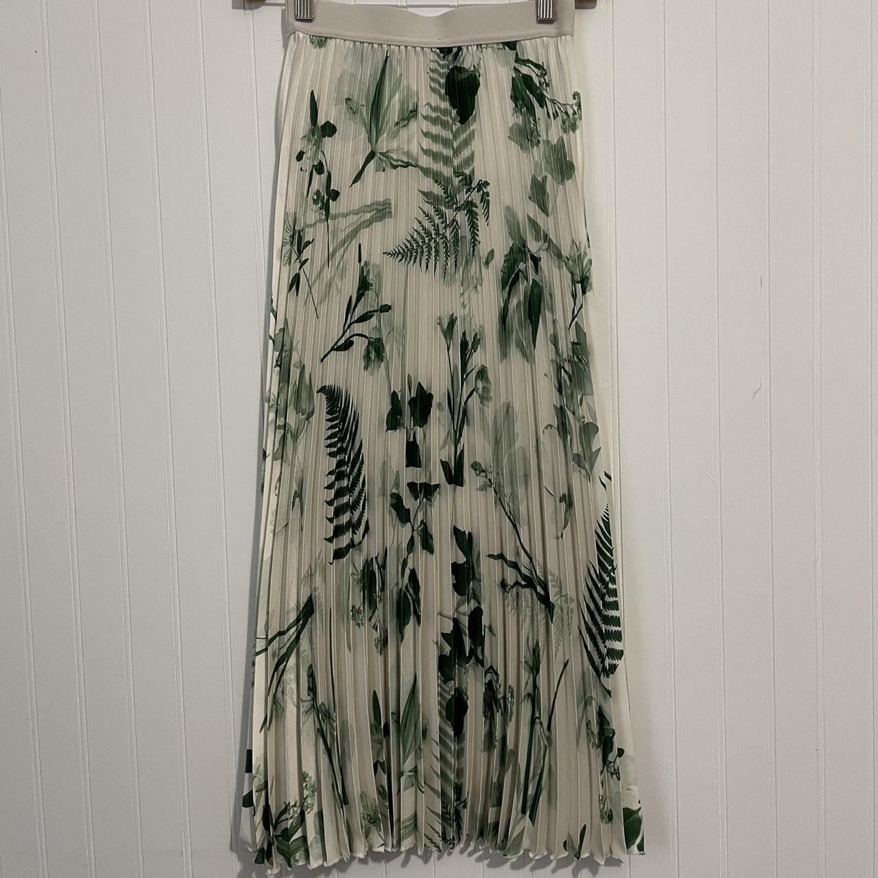 H and M pleated skirt with a plants Depop