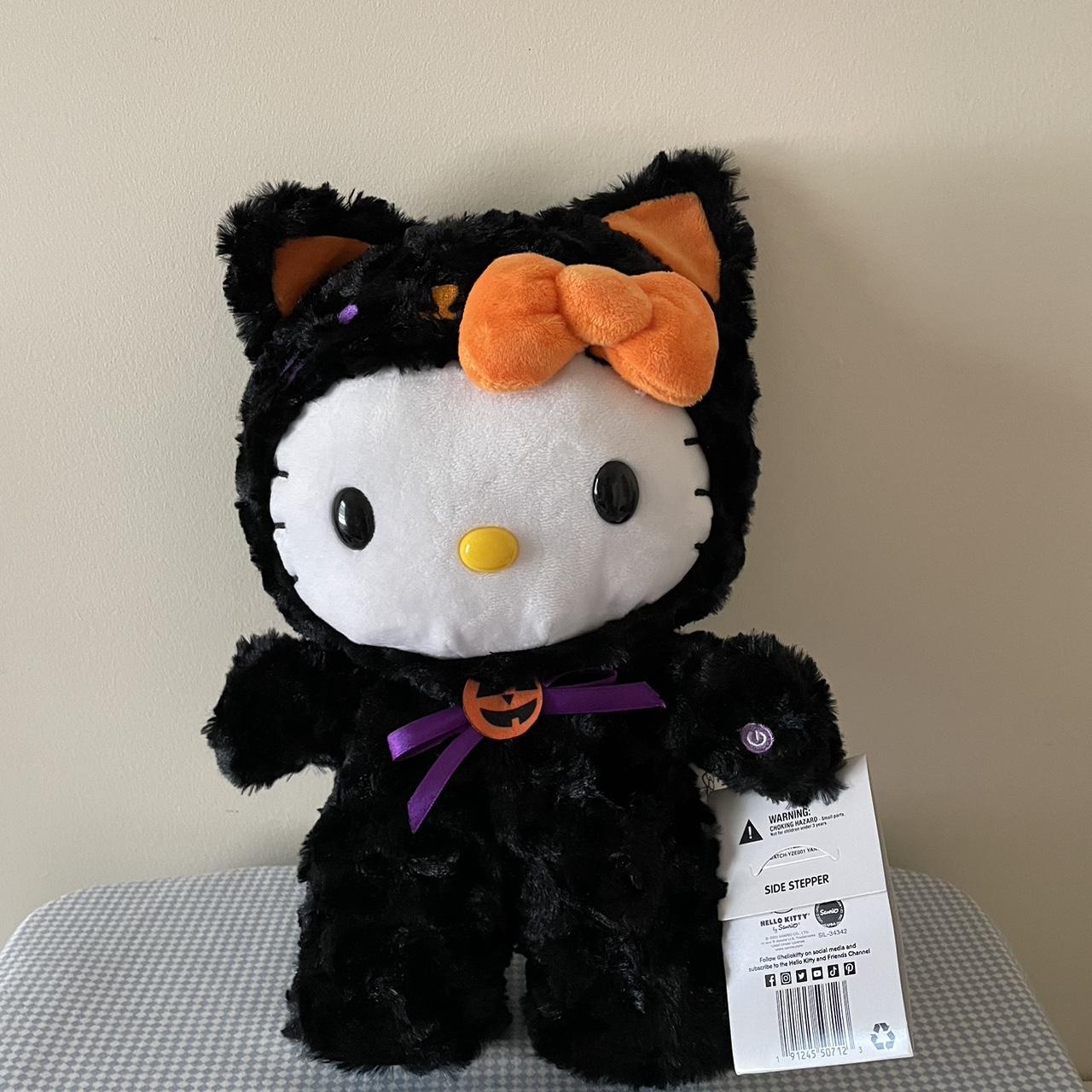 Hello Kitty black waterproof vinyl wraparound - Depop