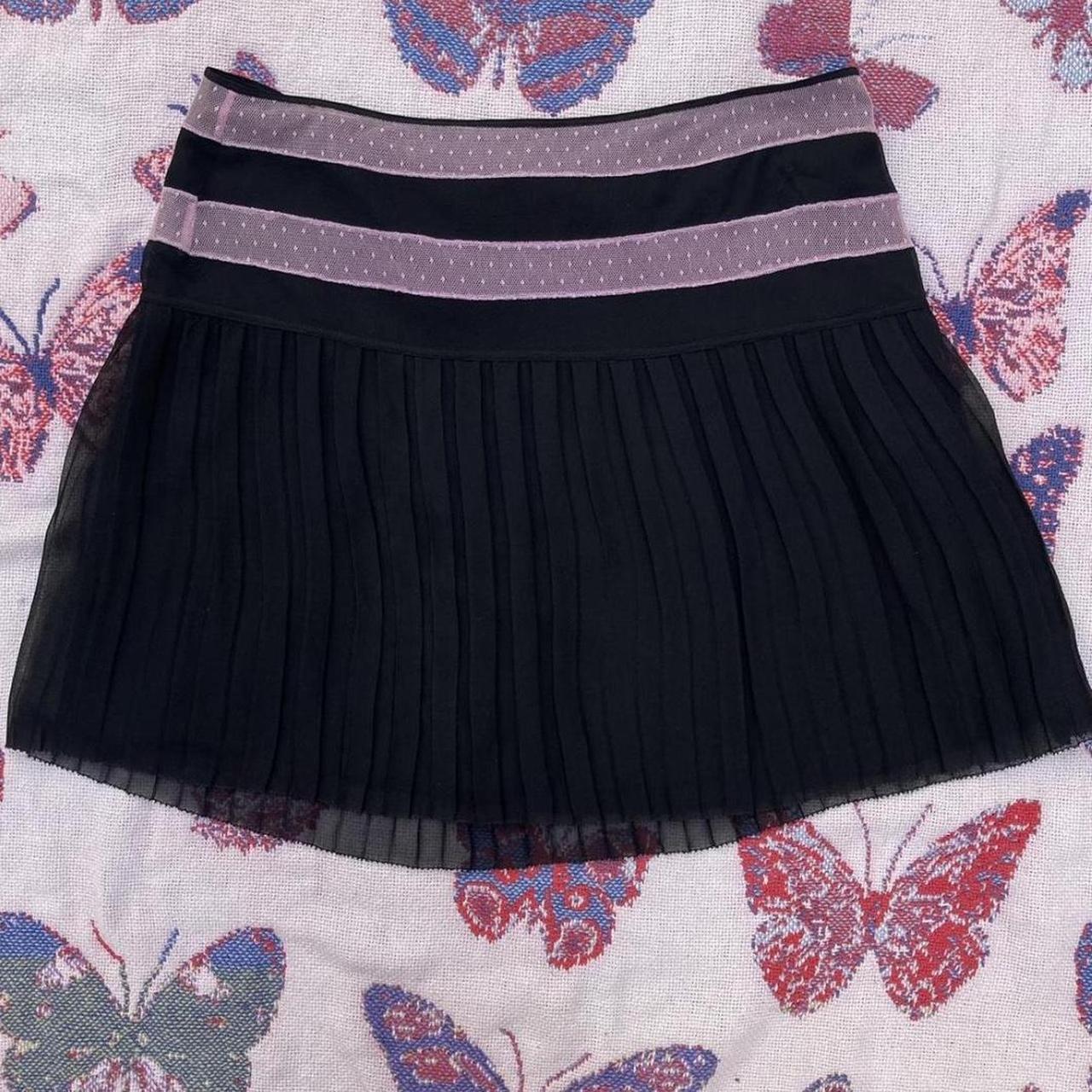 Black and pink pleated mini skirt Betsey Johnson. Depop