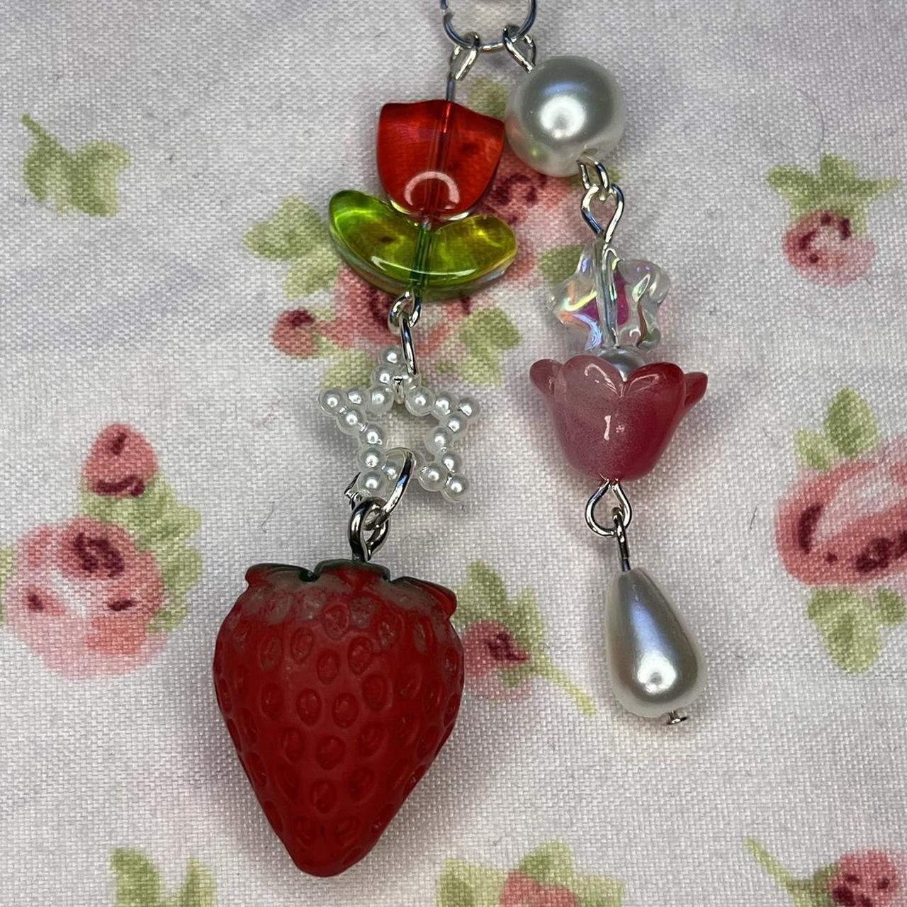 Strawberry keychain ──★ ˙🍓 ̟ !! ♡ pearls,red,clear... - Depop