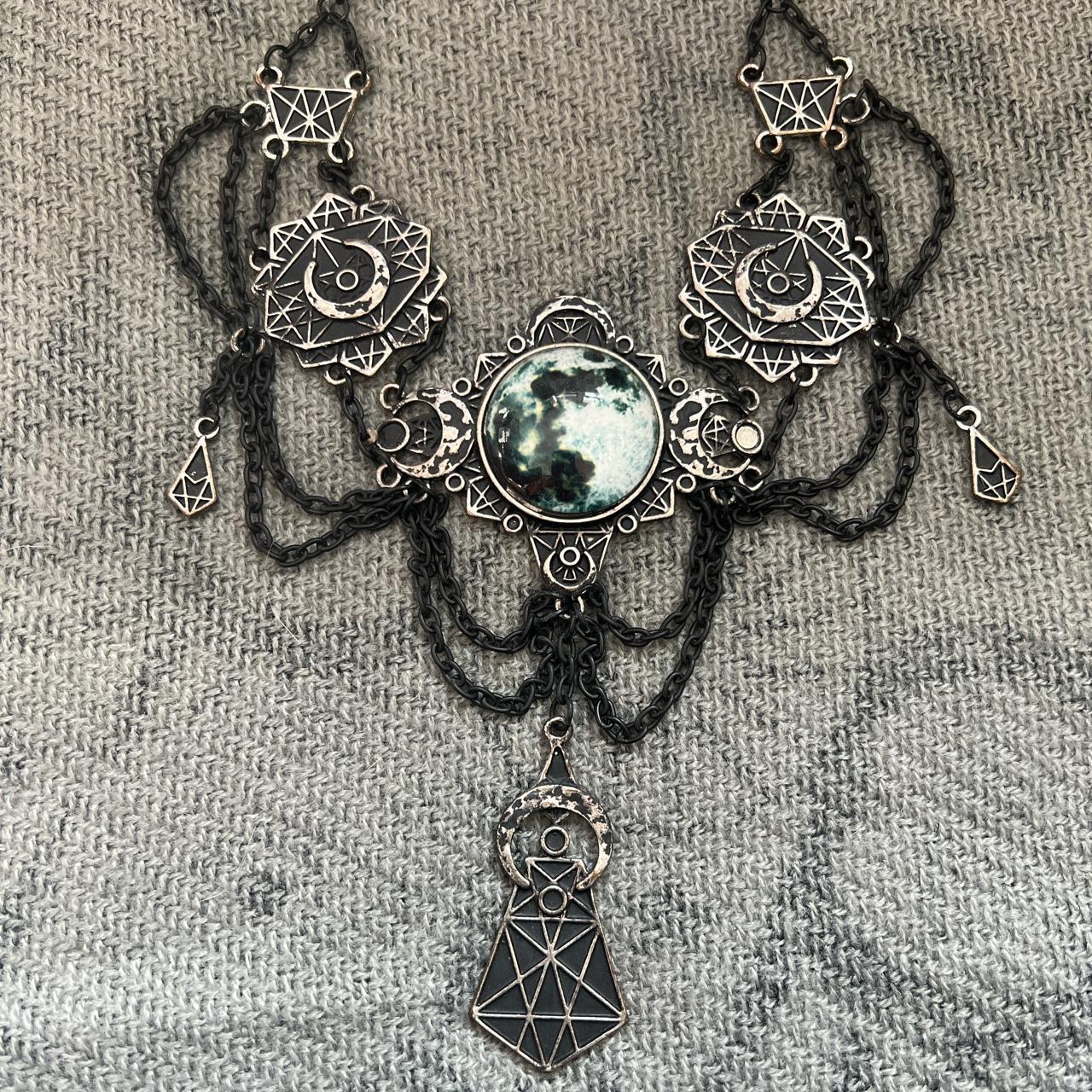 Mixed metal choker/bib necklace with lunar symbols... - Depop