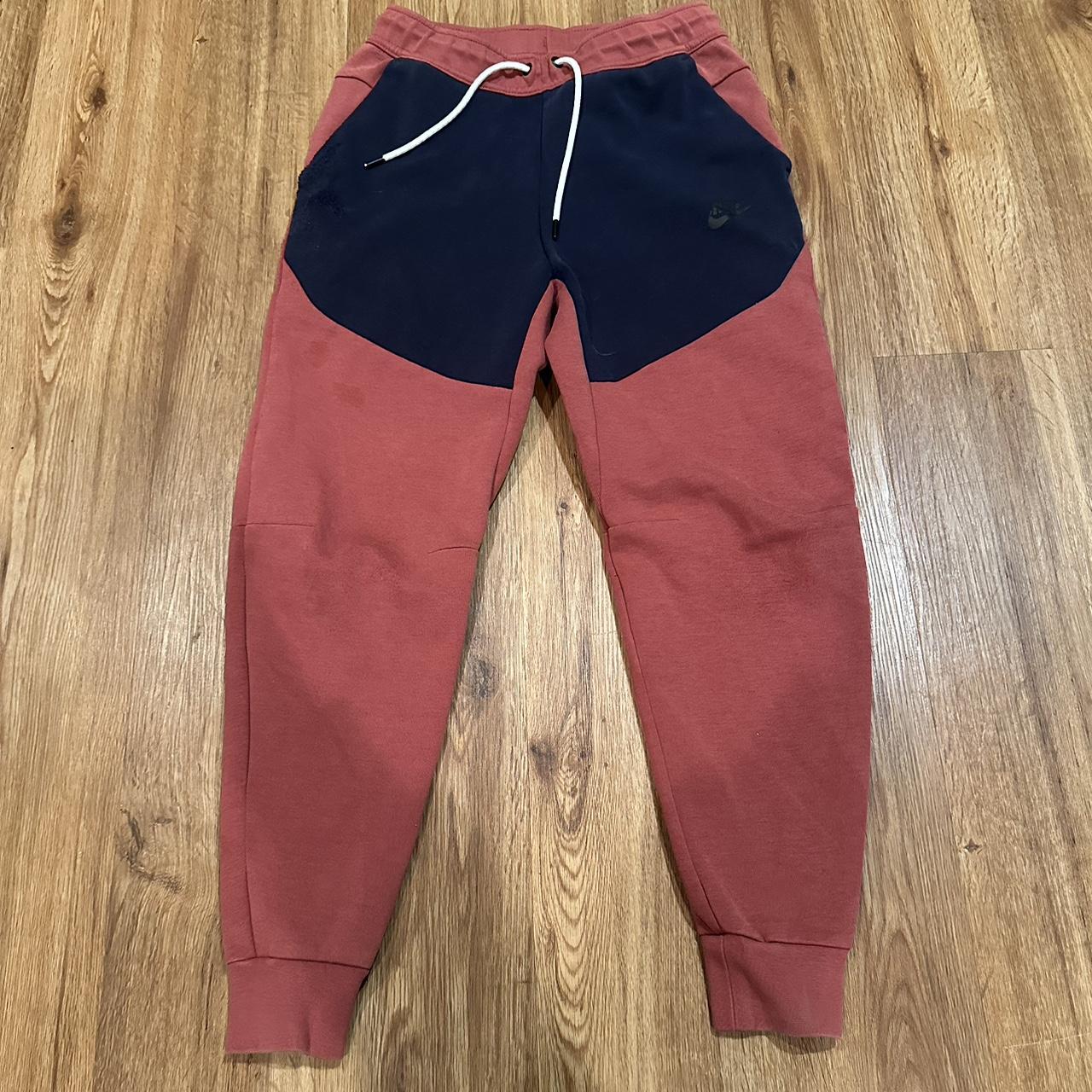 Nike Tech Pants Size XS There is a tiny fray on Depop