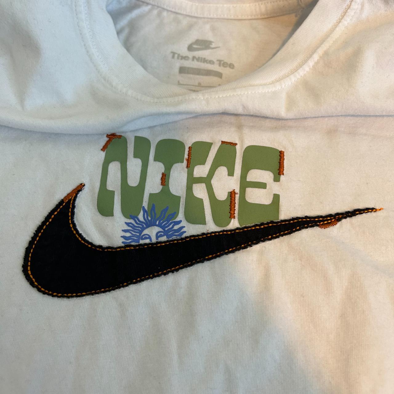 multi colored nike shirt