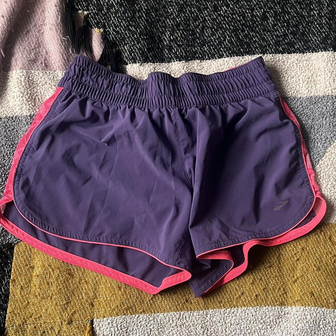 Brooks Running Shorts - purple & pink, size... - Depop