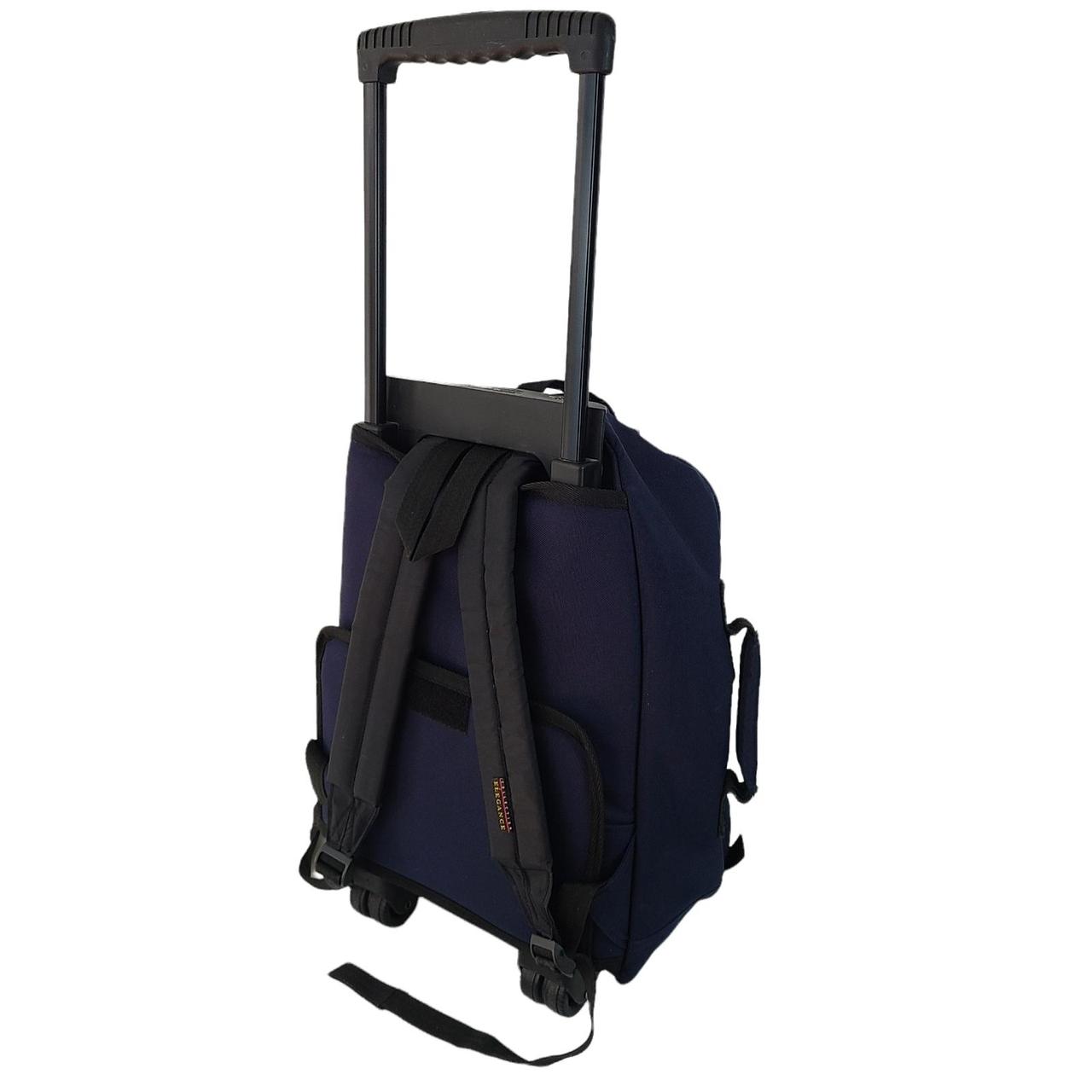 Olympia Sports Plus rolling backpack with extension... Depop