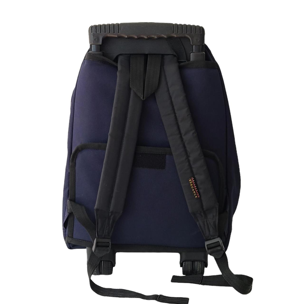 Olympia Sports Plus rolling backpack with extension... Depop