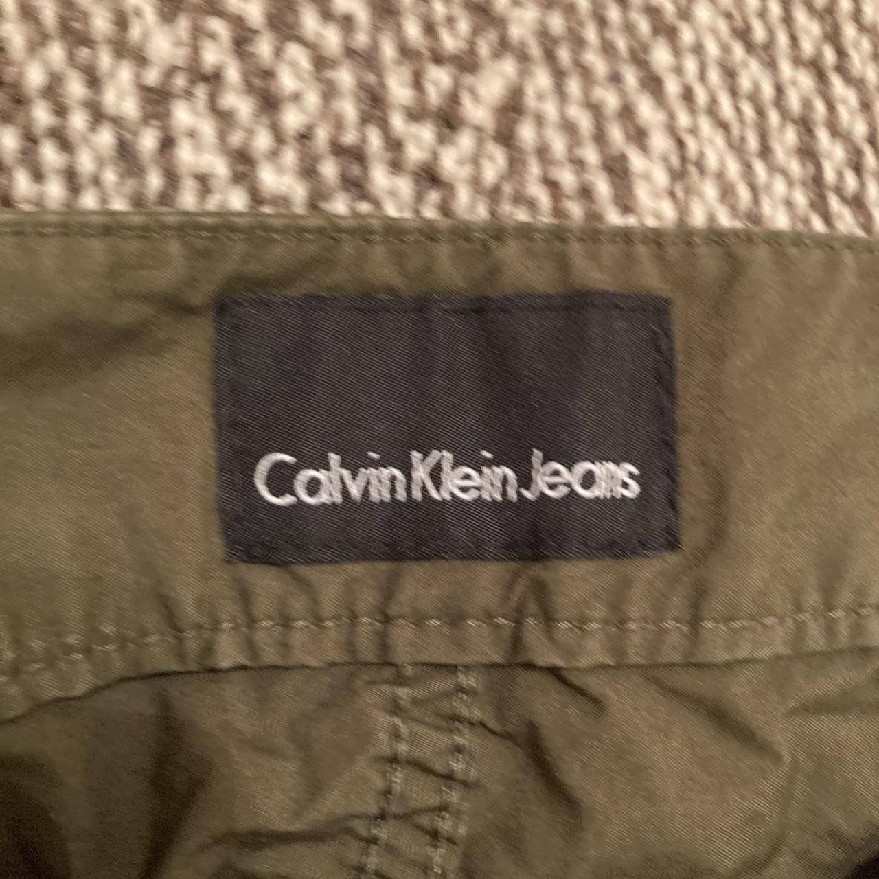 Calvin Klein Jeans Men's Khaki and Green Trousers | Depop