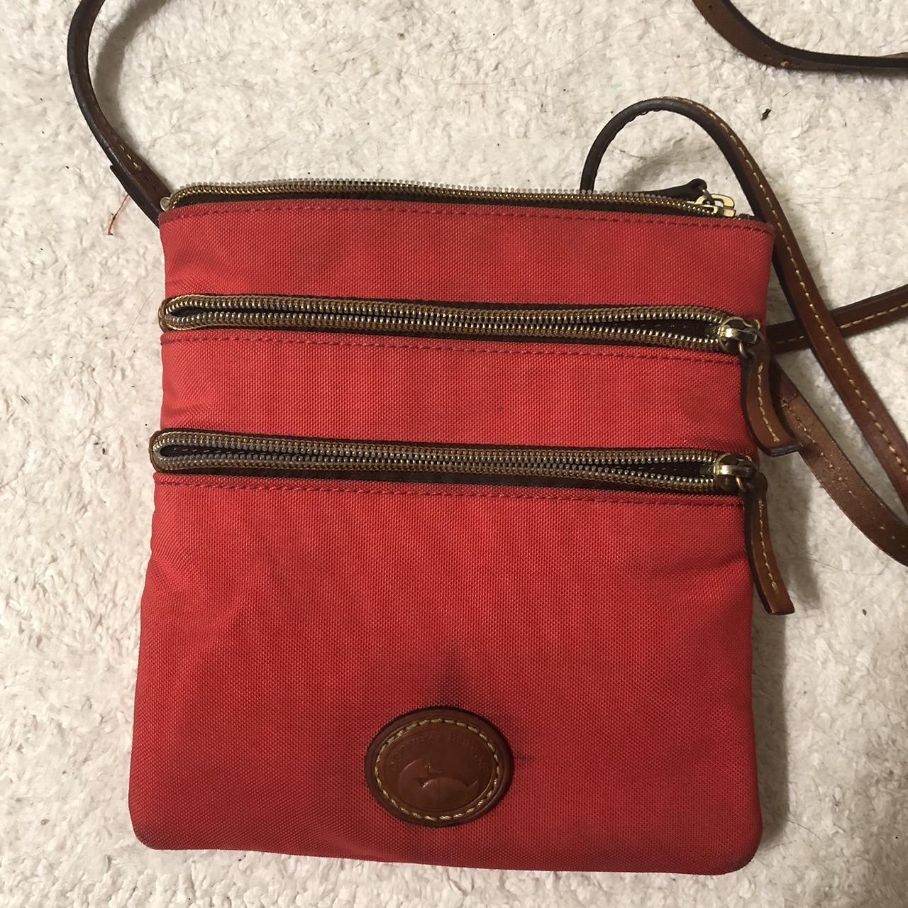 Dooney & Bourke 3 pocket red crossbody bag. Light... - Depop