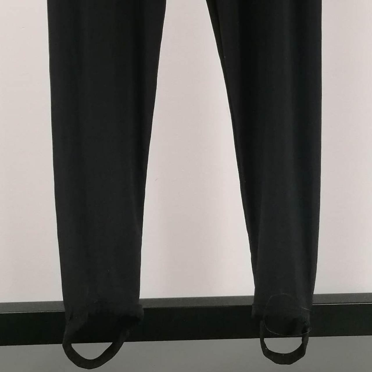Sheer black leggings with stirrup straps at the... Depop