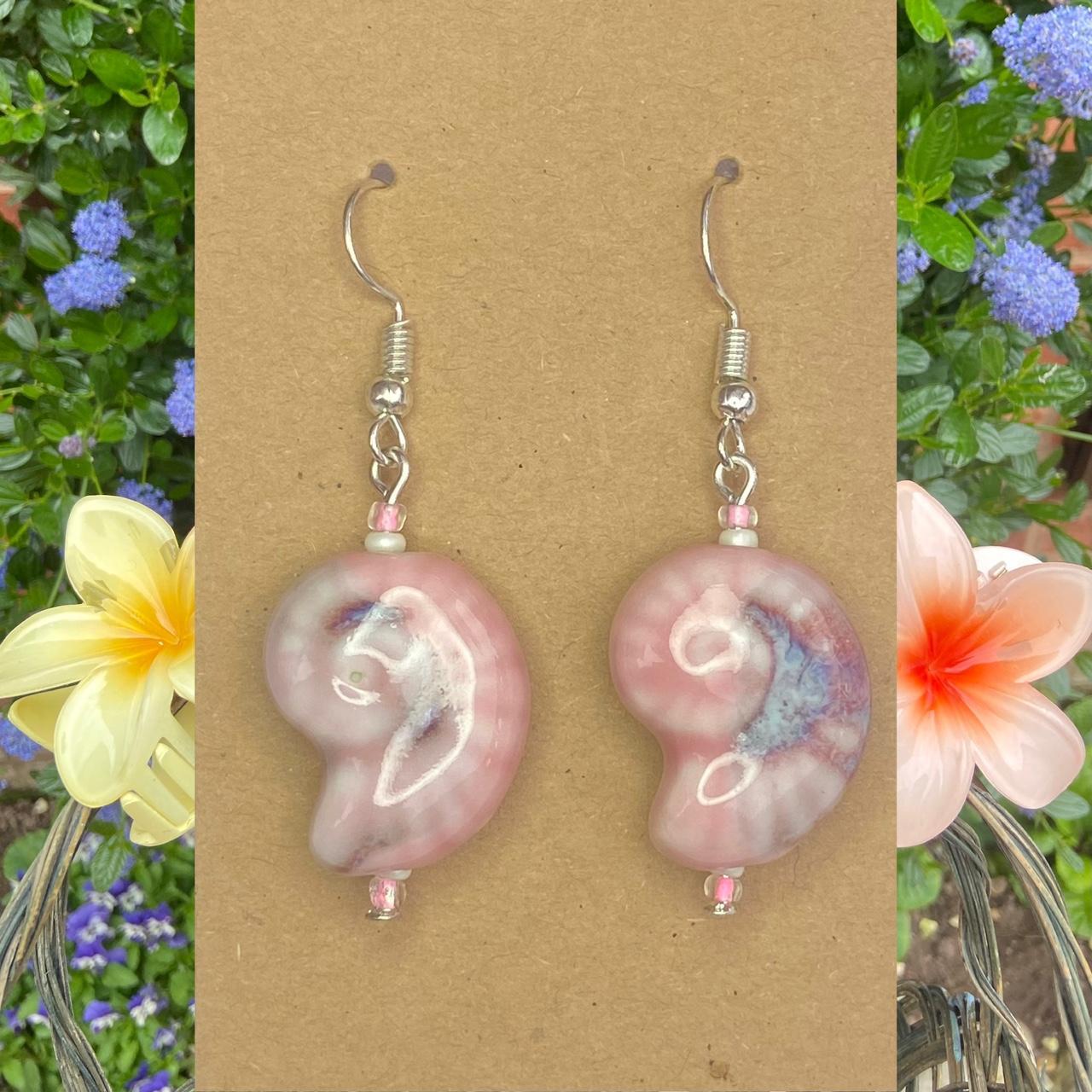 Beautiful mermaid shell ammonite in a baby pink... - Depop