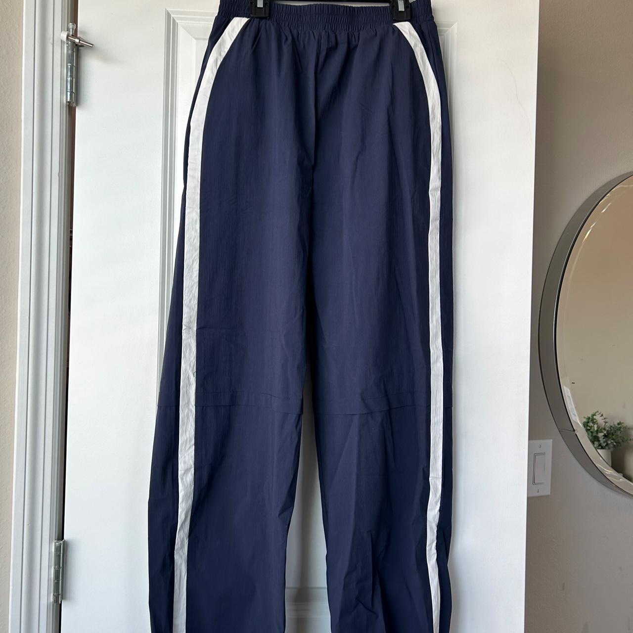 Navy Princess Polly track pants with Depop