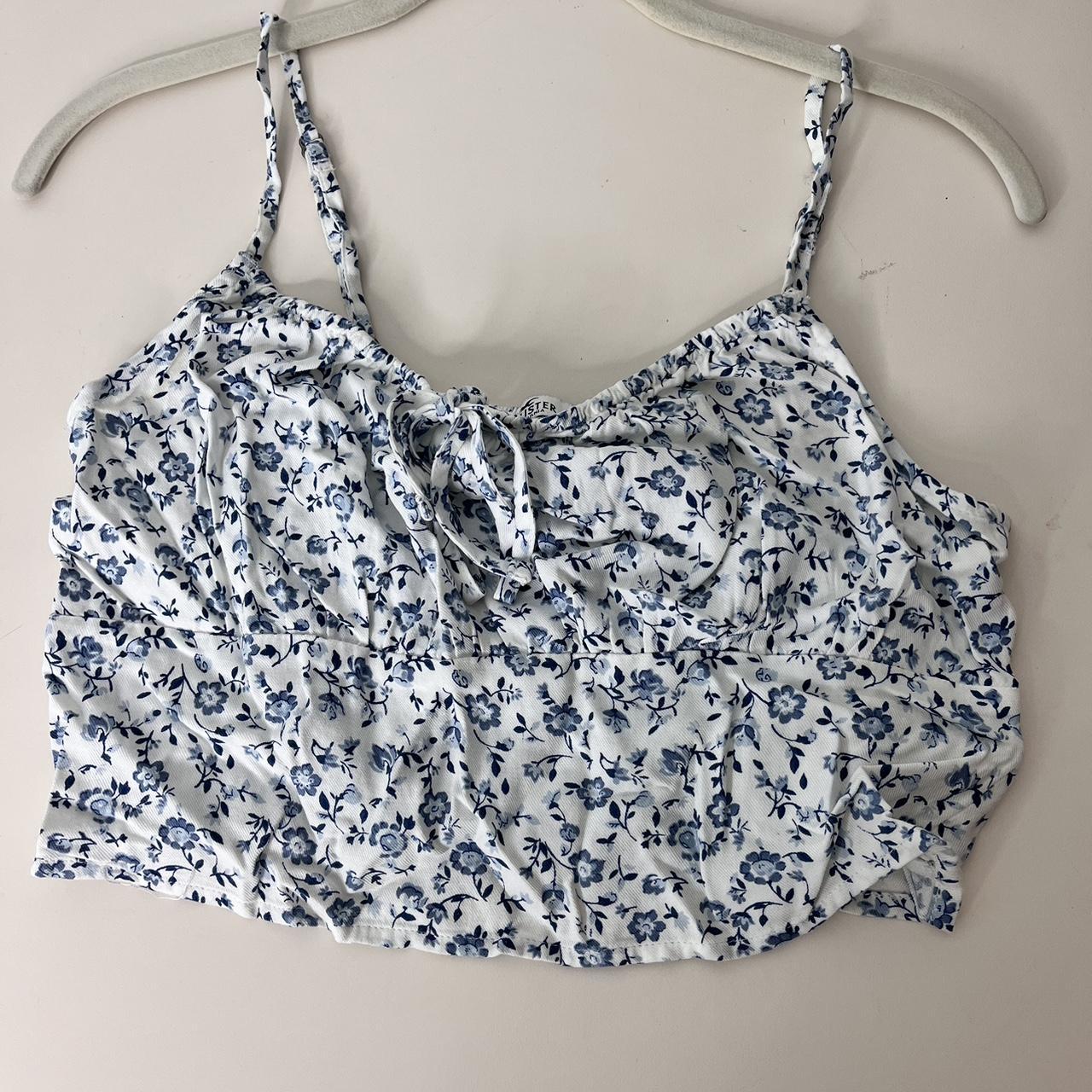 Blue and white floral Hollister tank top Size... - Depop