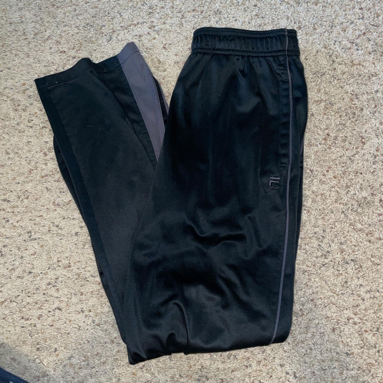 Fila Sport Sweatpants. Size medium, has a burn hole - Depop
