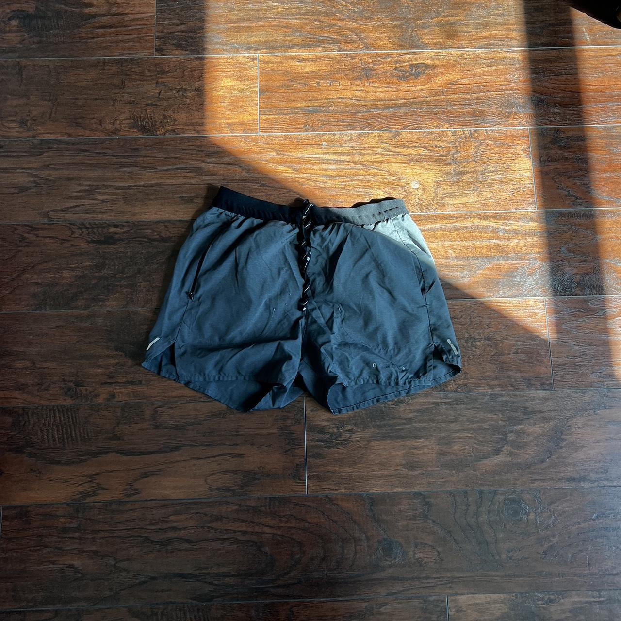 young la mens shorts small grey/black Depop