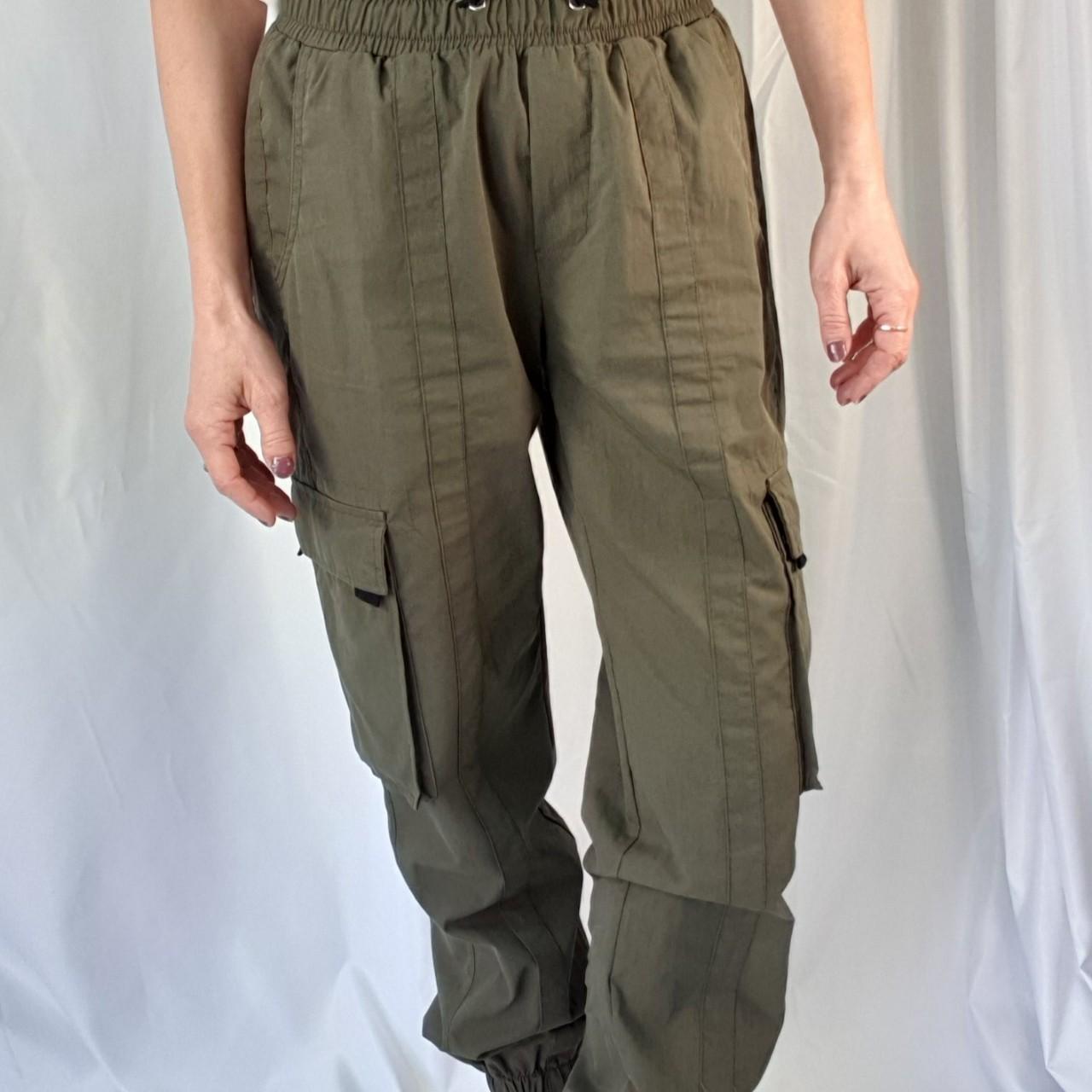 Bershka cuffed cargo trousers in kaki. Size Mex... Depop
