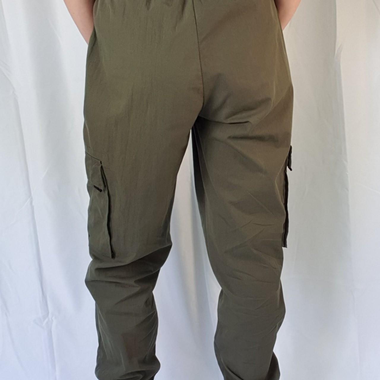 Bershka cuffed cargo trousers in kaki. Size Mex... Depop