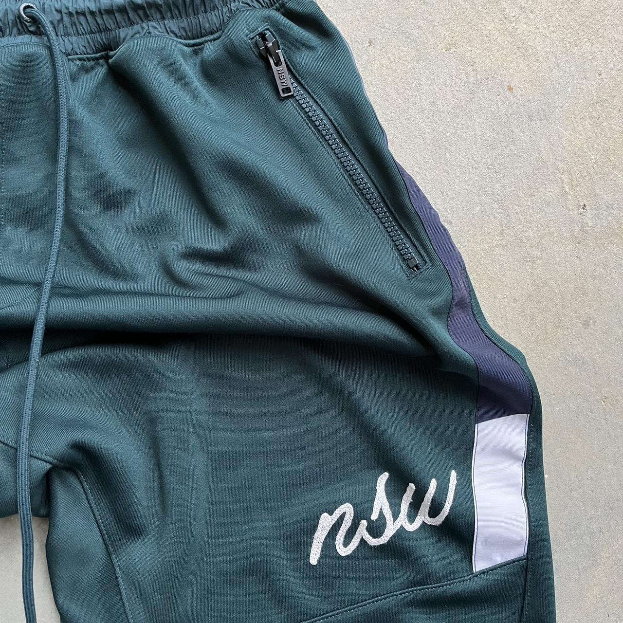 nsw nike track pants