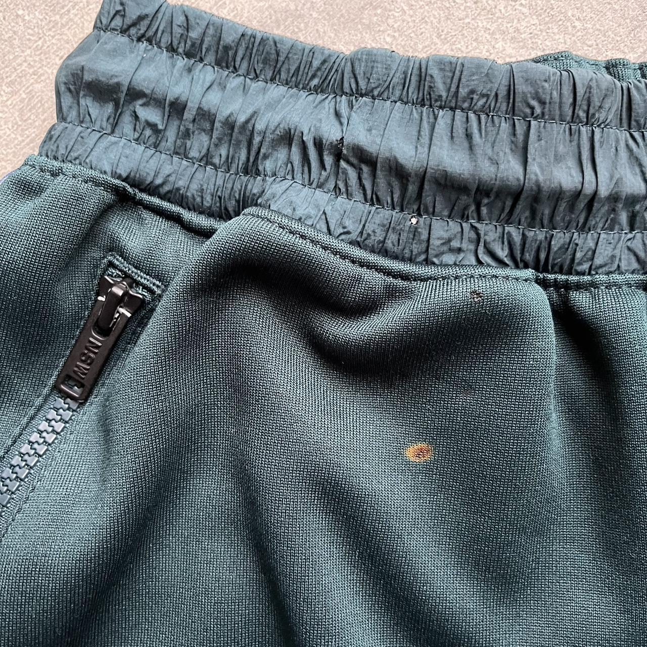 nsw nike track pants