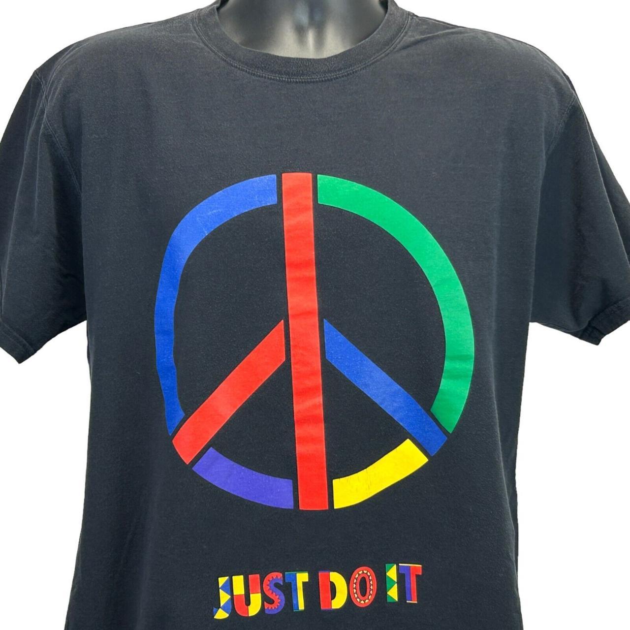 Nike peace sign hot sale shirt