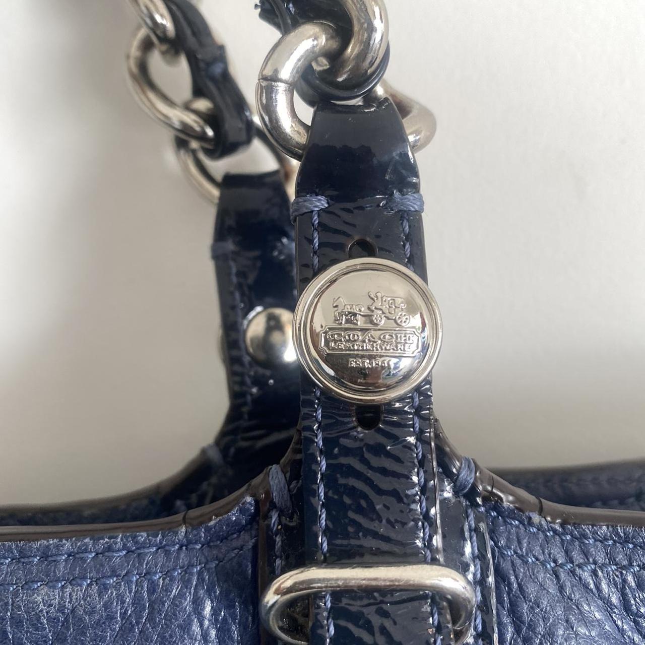 A dark navy blue cow leather Coach shoulder bag from - Depop