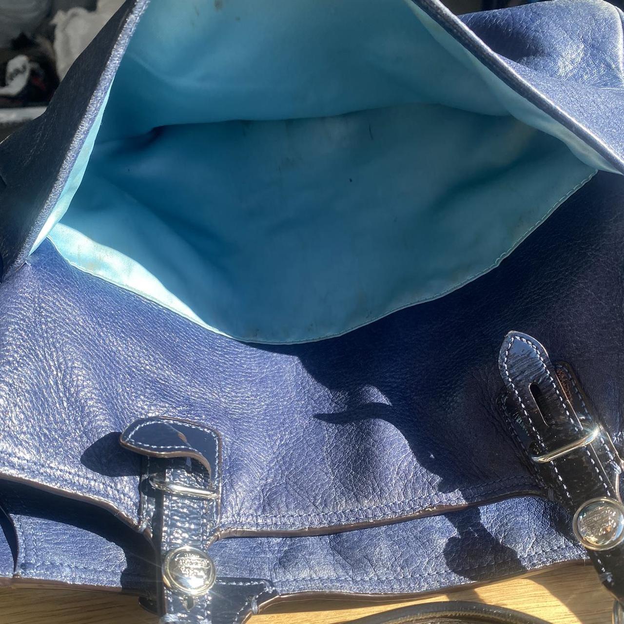 A dark navy blue cow leather Coach shoulder bag from - Depop