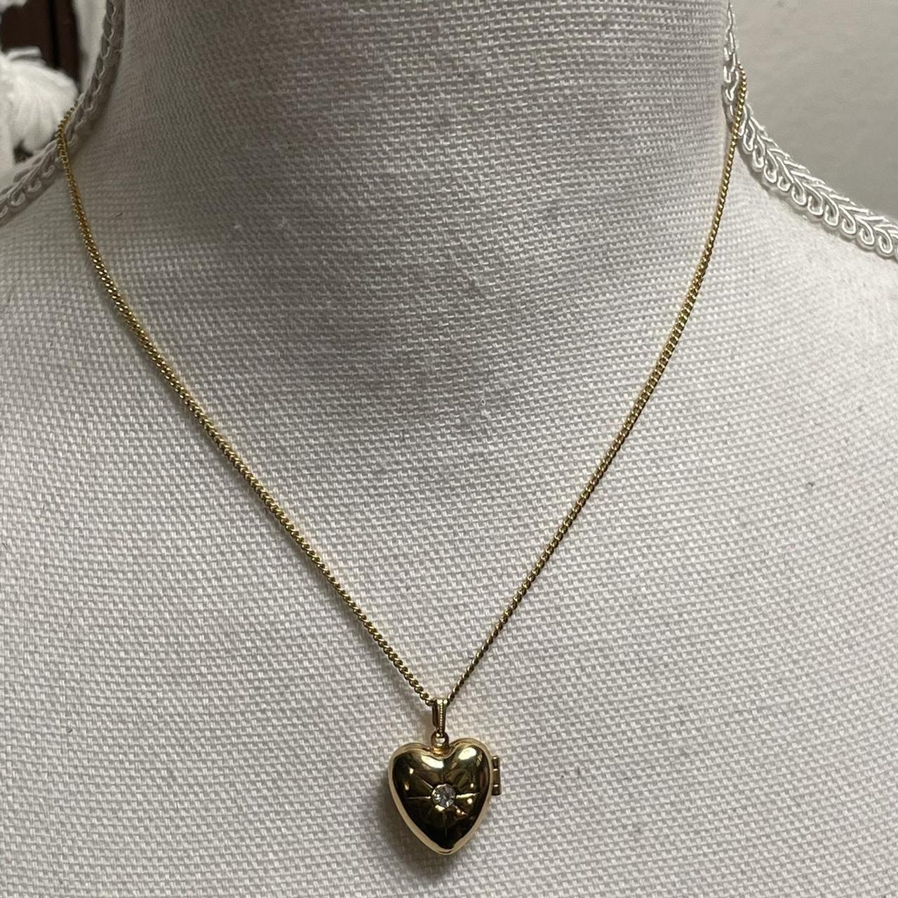 Dainty vintage Avon perfume locket, heart-shaped... - Depop