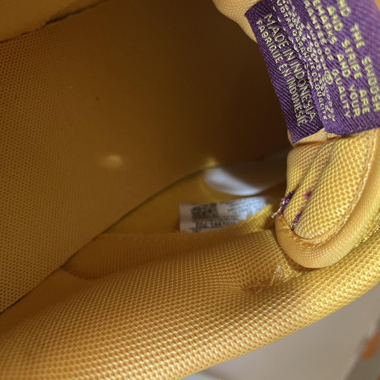 university gold nike