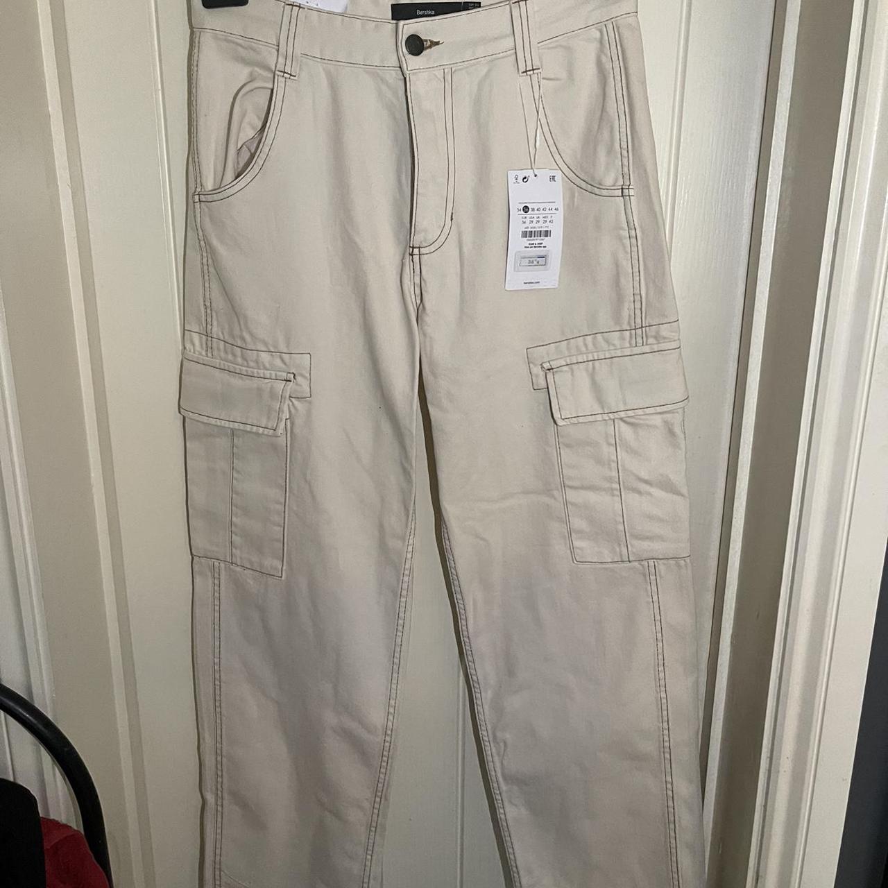 Wide-leg cream cargo trousers with contrast... - Depop