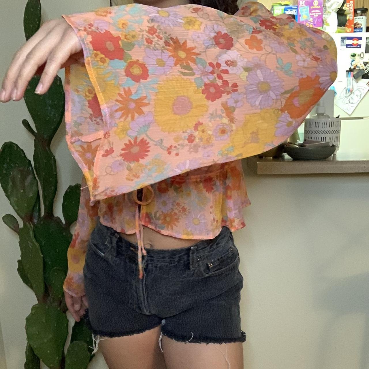 WILD FABLE Flowy Pink Floral Tie Top, The sleeves are