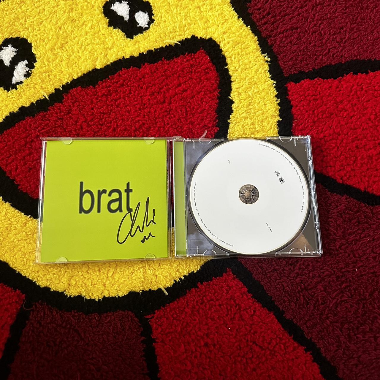 Charli Xcx SIGNED “brat” CD (IN HAND) Ready To Ship... - Depop